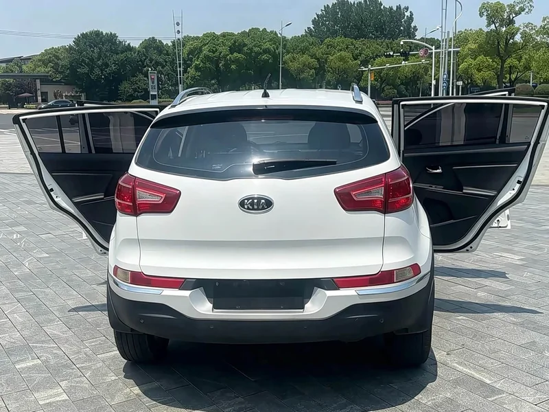 Kia Sportage — фото 10