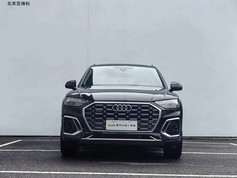 Audi Q5L — фото 11