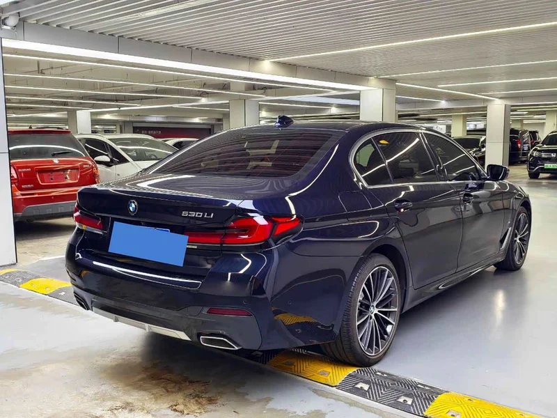 BMW 5-Series — фото 16