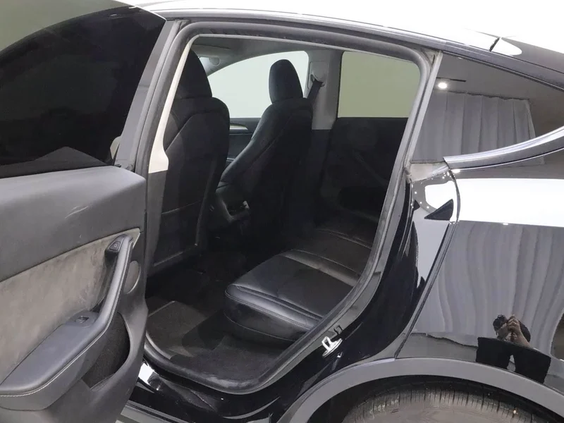Tesla Model Y — фото 11