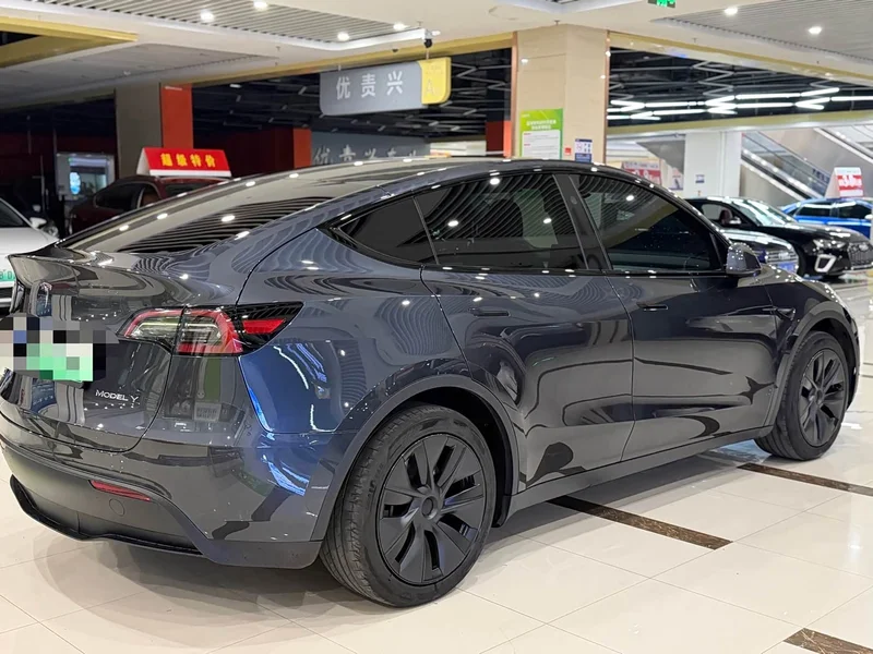 Tesla Model Y — фото 9