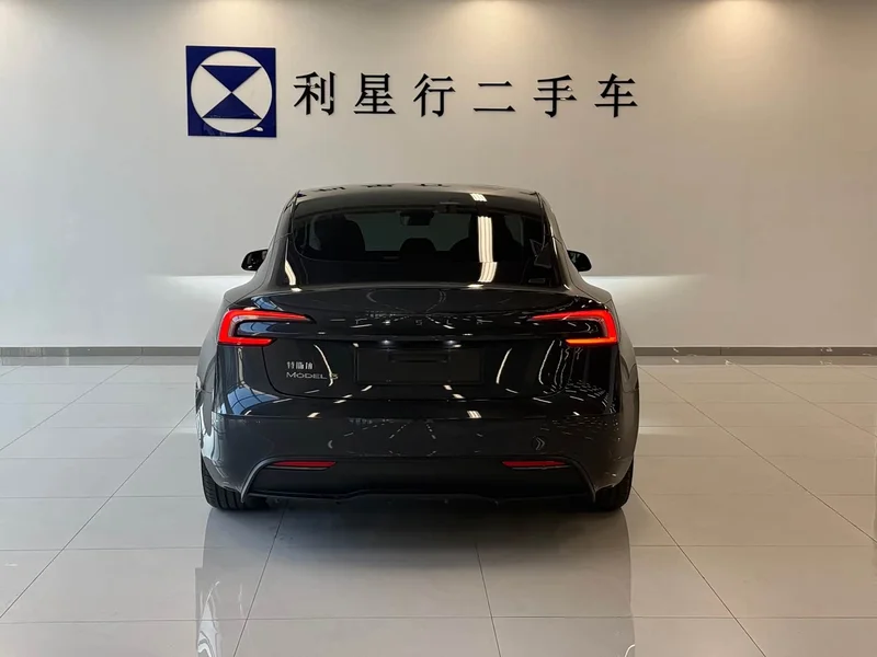Tesla Model 3 — фото 18