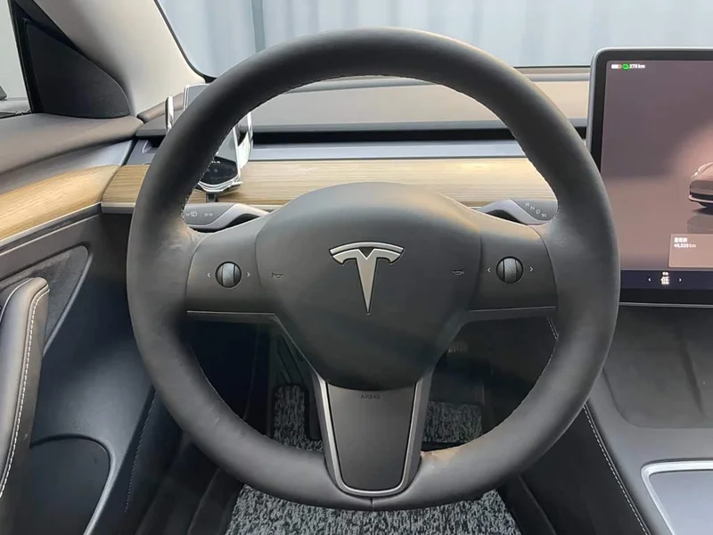 Tesla Model 3 — фото 14
