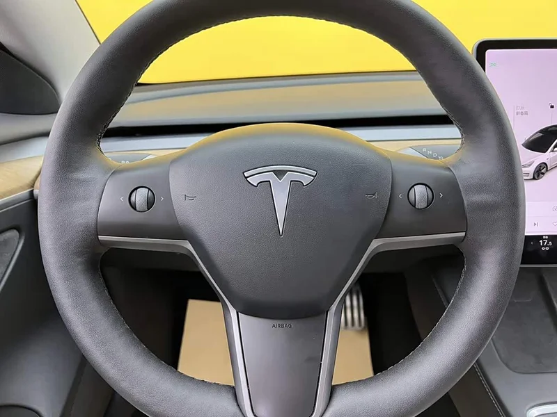 Tesla Model 3 — фото 11