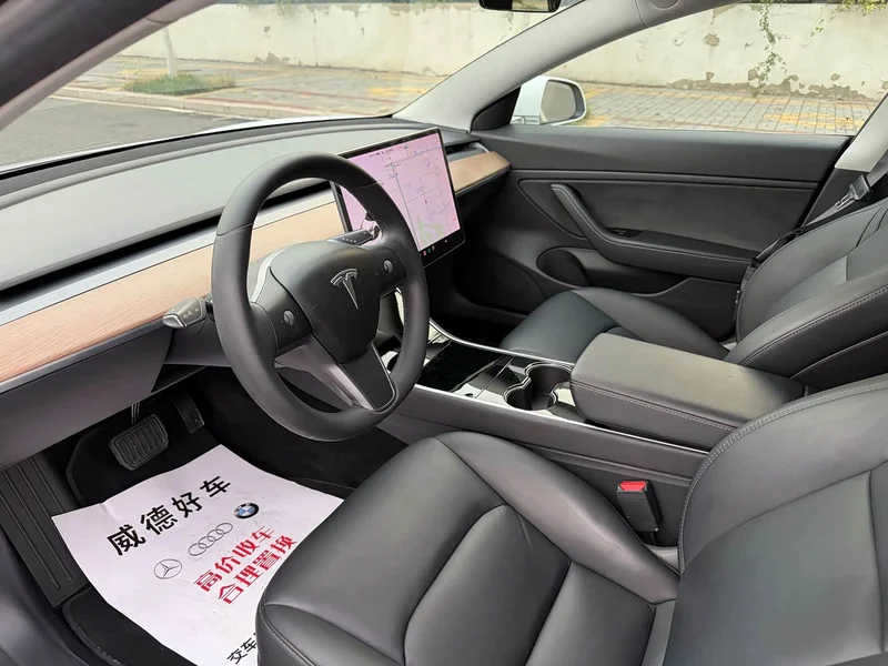 Tesla Model 3 — фото 10