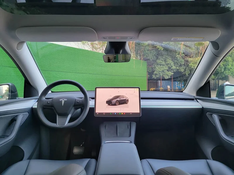Tesla Model Y — фото 14
