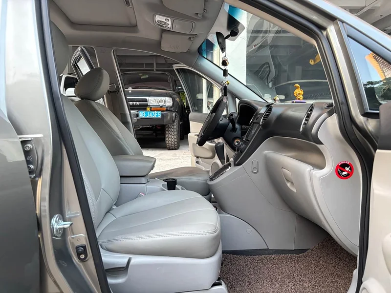 Kia Carens — фото 12