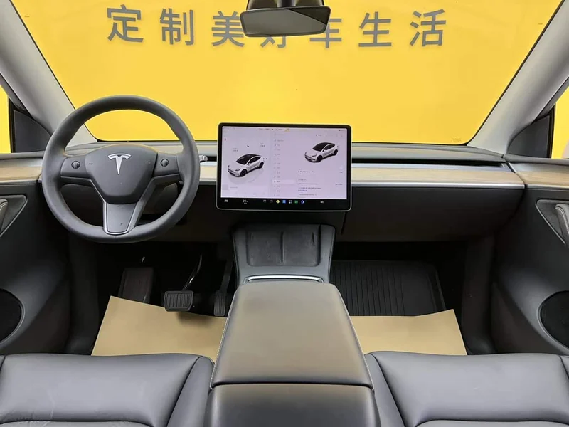 Tesla Model Y — фото 35