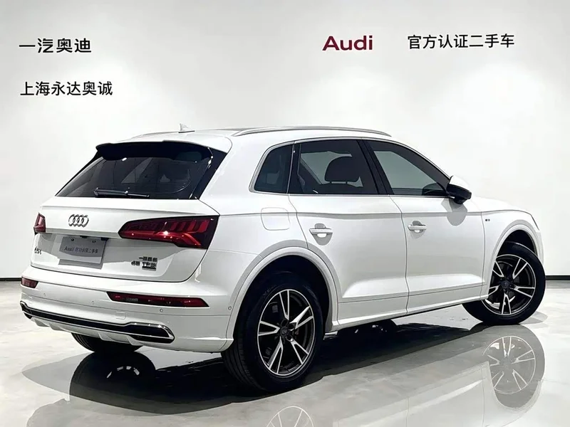Audi Q5L — фото 5