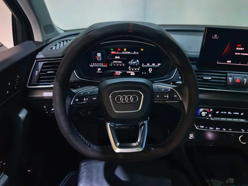 Audi Q5L — фото 9