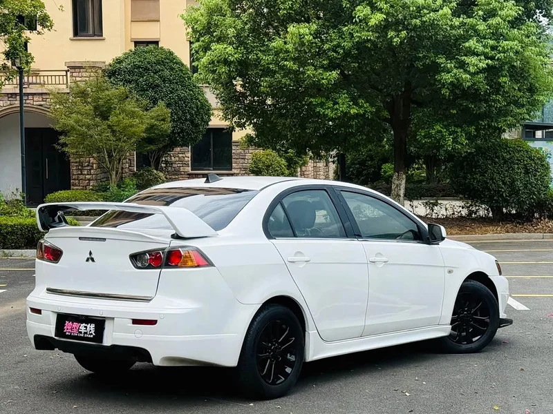 Mitsubishi Lancer EX — фото 13