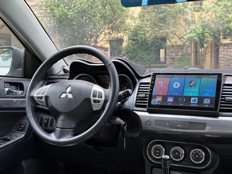 Mitsubishi Lancer EX — фото 9
