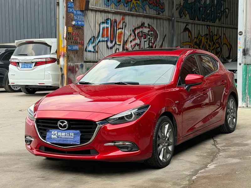 Mazda 3 Axela — фото 1