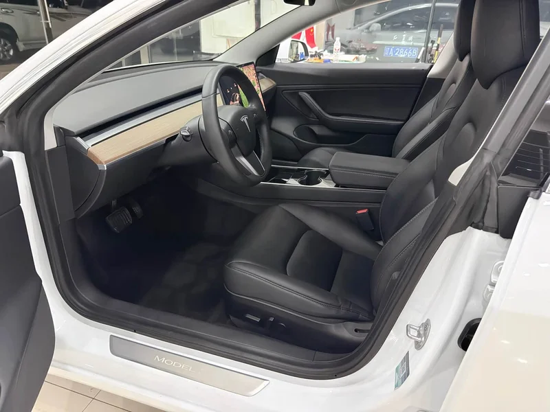 Tesla Model 3 — фото 5