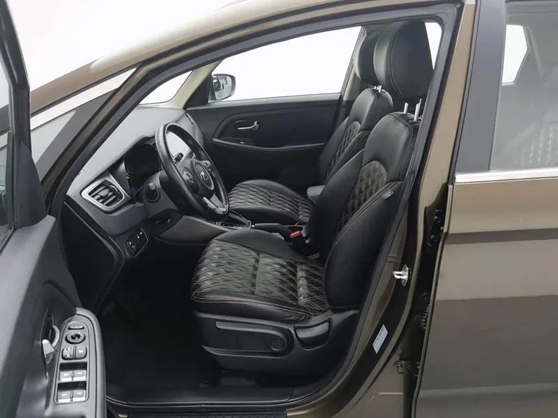 Kia Carens — фото 10