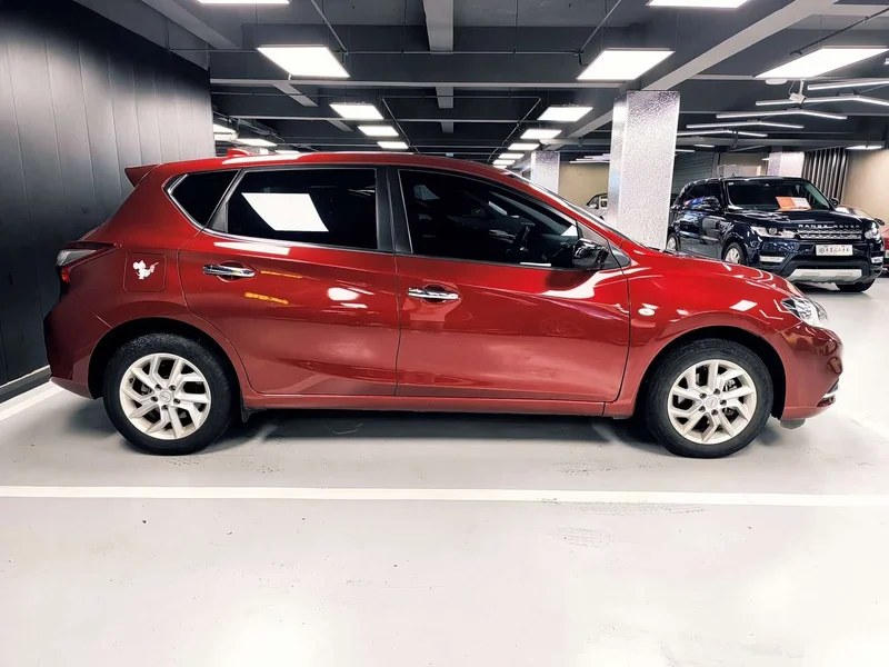 Nissan Tiida — фото 4