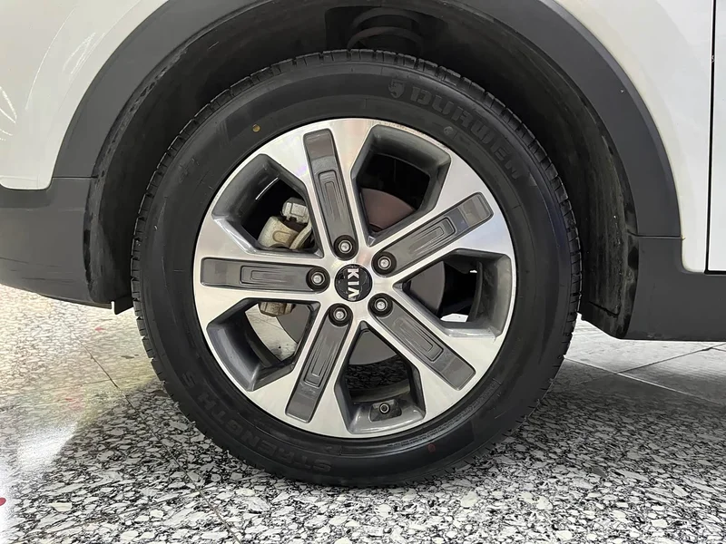 Kia Sportage — фото 14
