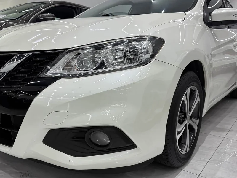 Nissan Tiida — фото 10