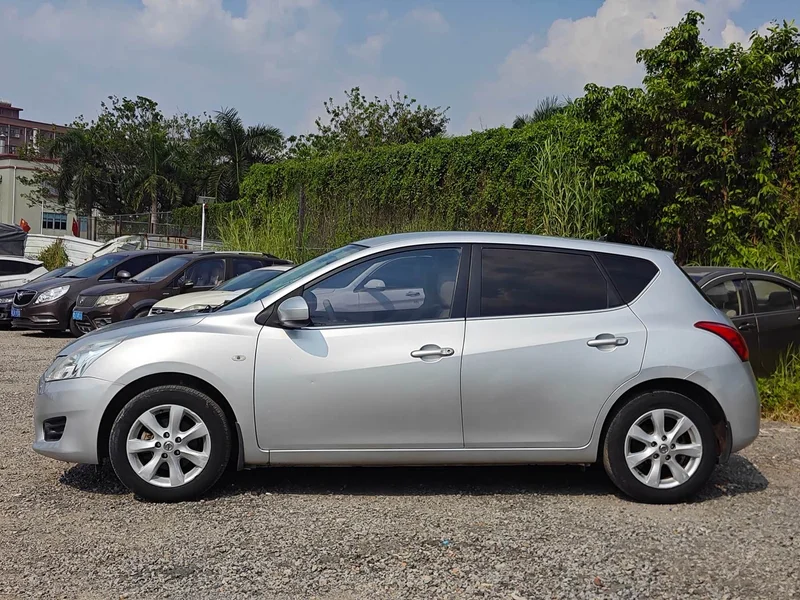 Nissan Tiida — фото 6