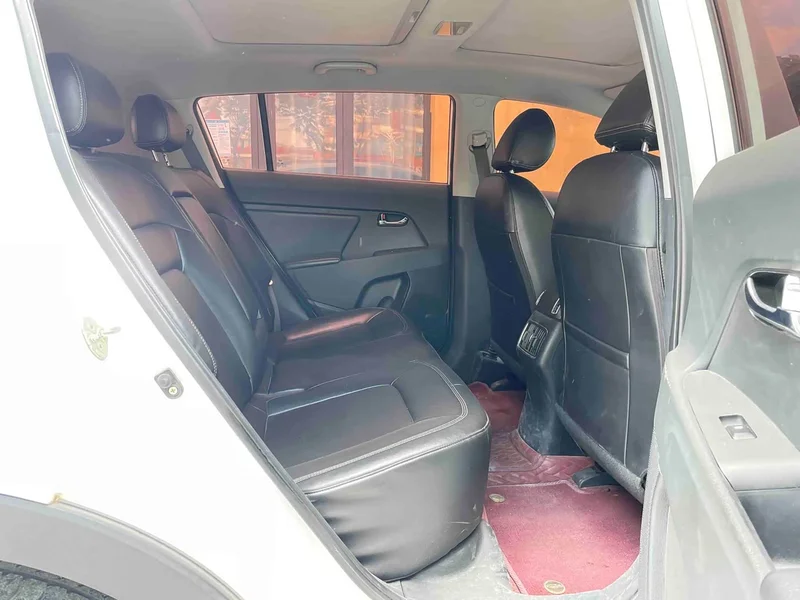 Kia Sportage — фото 11