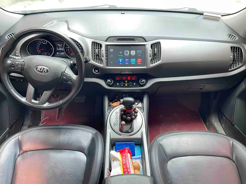 Kia Sportage — фото 7