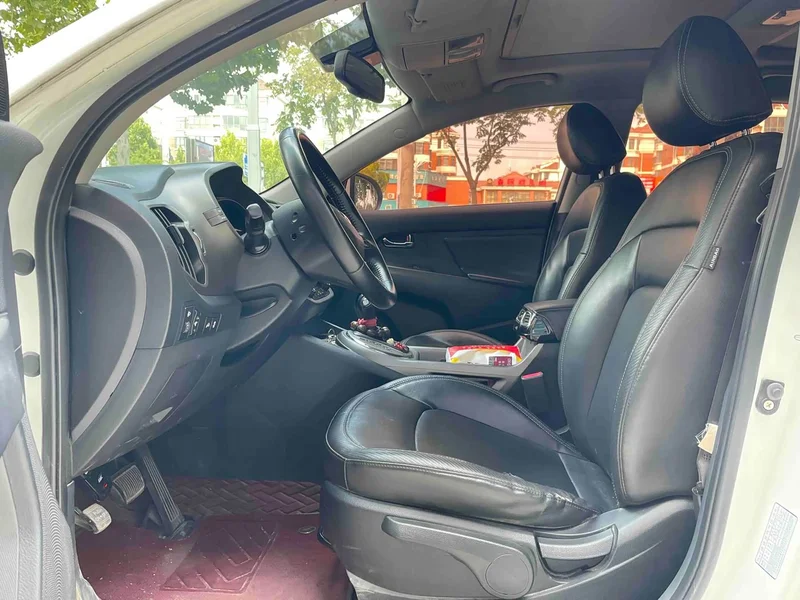 Kia Sportage — фото 9