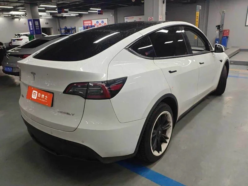 Tesla Model Y — фото 7