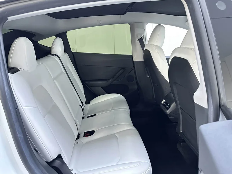 Tesla Model Y — фото 16