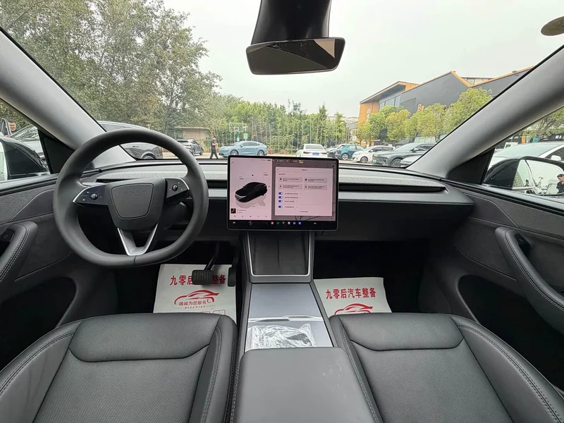 Tesla Model Y — фото 13