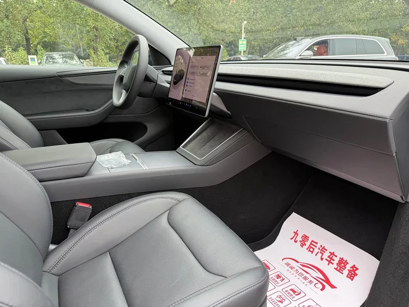 Tesla Model Y — фото 16