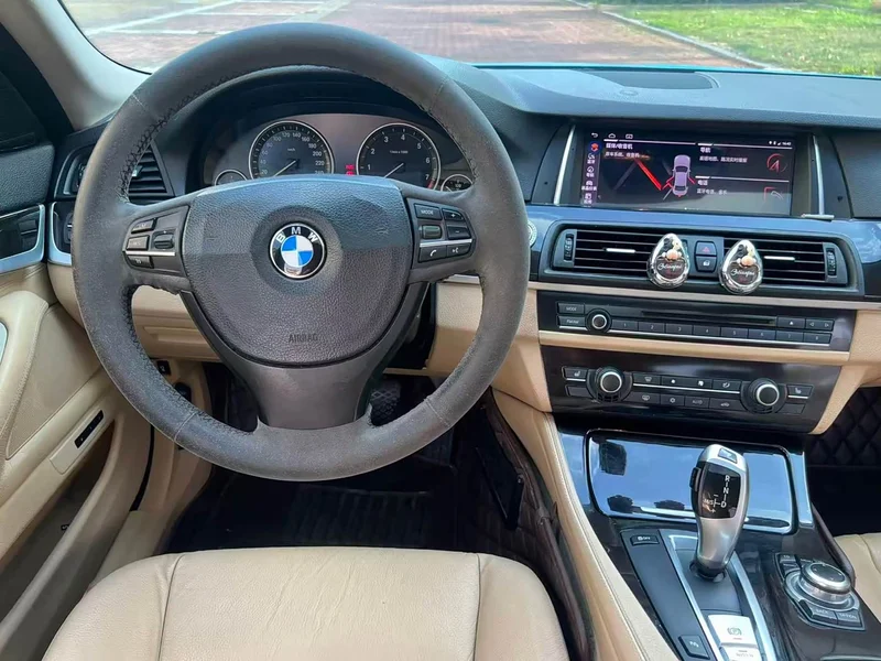 BMW 5-Series — фото 14