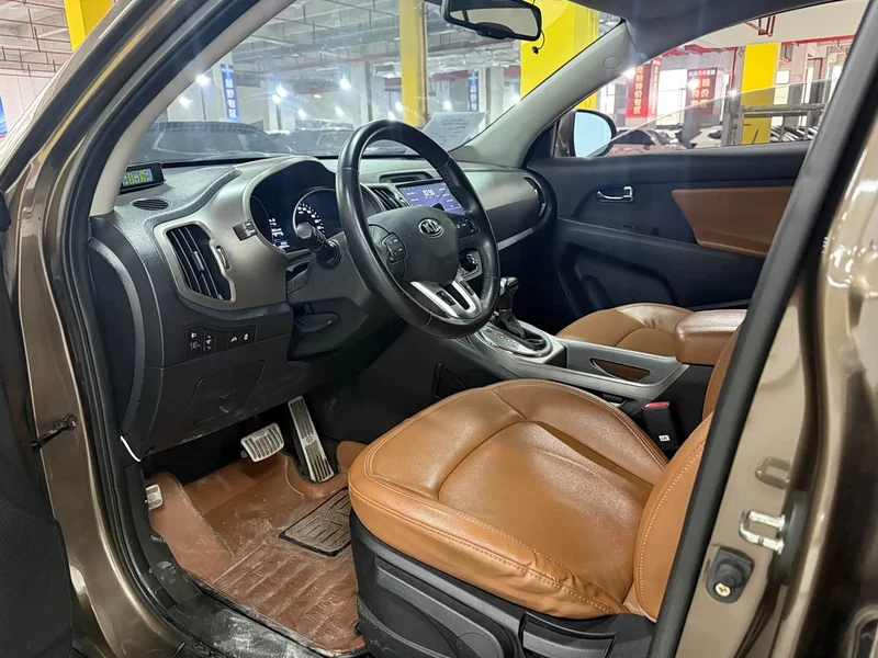 Kia Sportage — фото 6