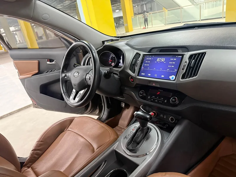 Kia Sportage — фото 9