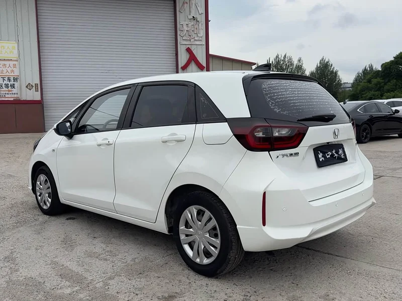 Honda Fit — фото 11