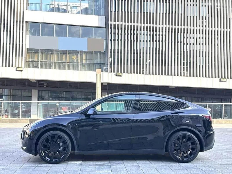 Tesla Model Y — фото 7