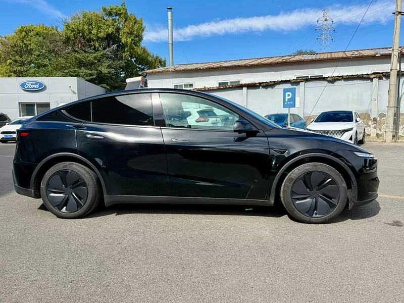 Tesla Model Y — фото 5