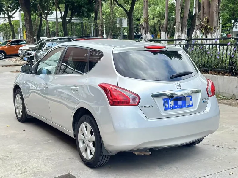 Nissan Tiida — фото 11