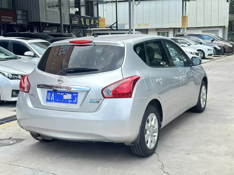 Nissan Tiida — фото 9