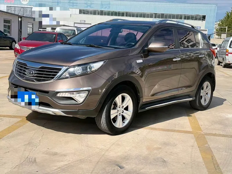 Kia Sportage — фото 7