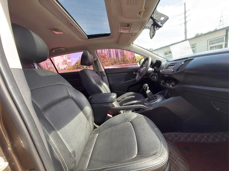 Kia Sportage — фото 8