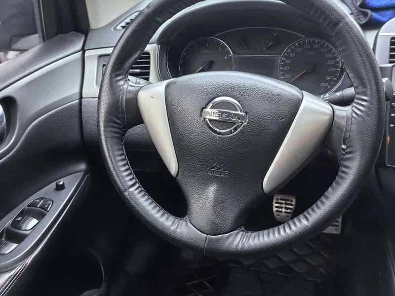 Nissan Tiida — фото 14