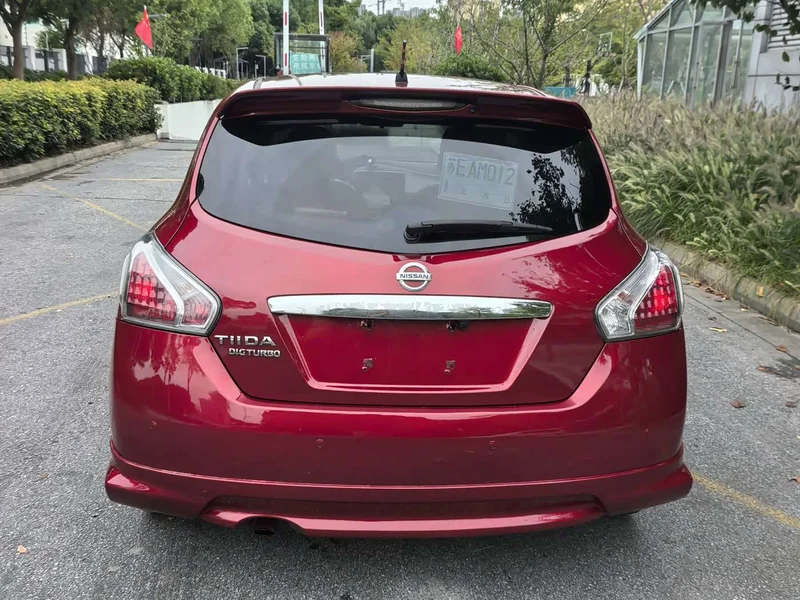 Nissan Tiida — фото 10