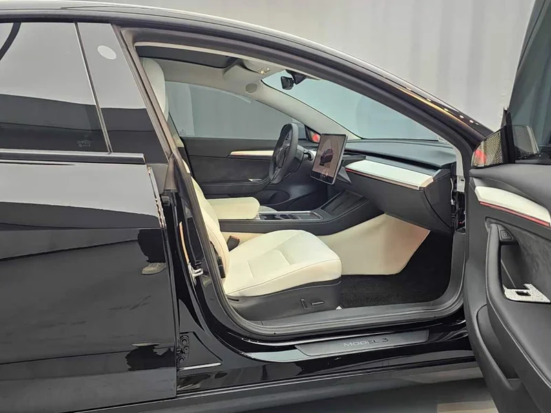 Tesla Model 3 — фото 14