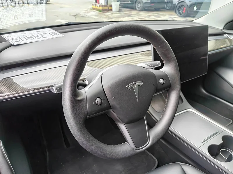 Tesla Model 3 — фото 11