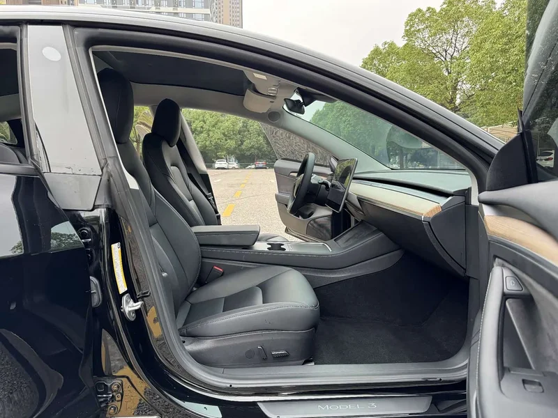 Tesla Model 3 — фото 17