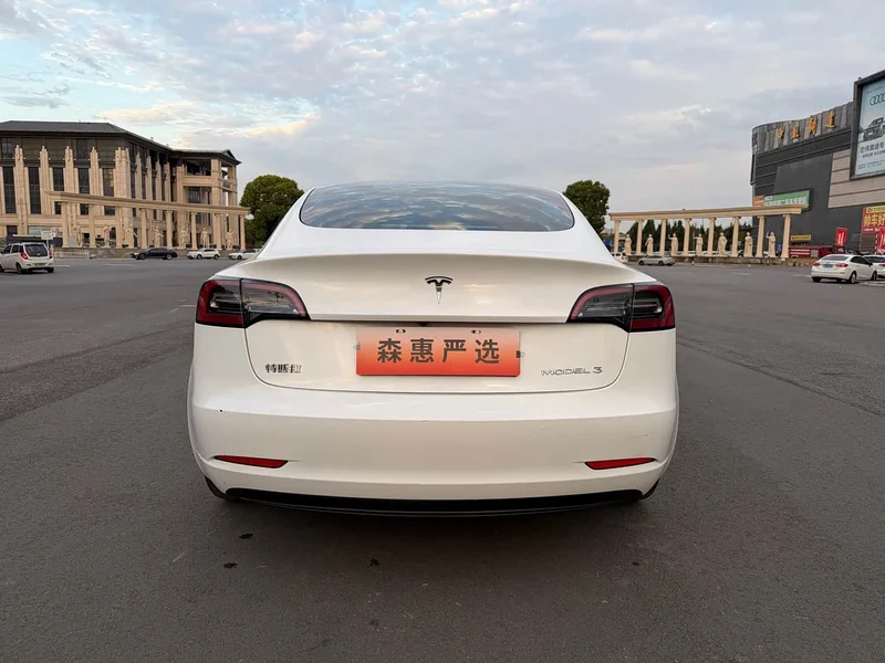 Tesla Model 3 — фото 17