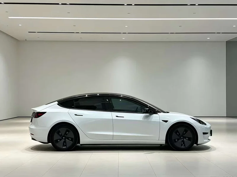 Tesla Model 3 — фото 9