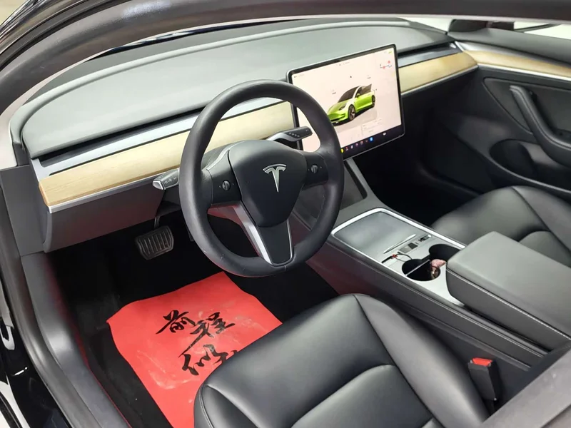 Tesla Model 3 — фото 14