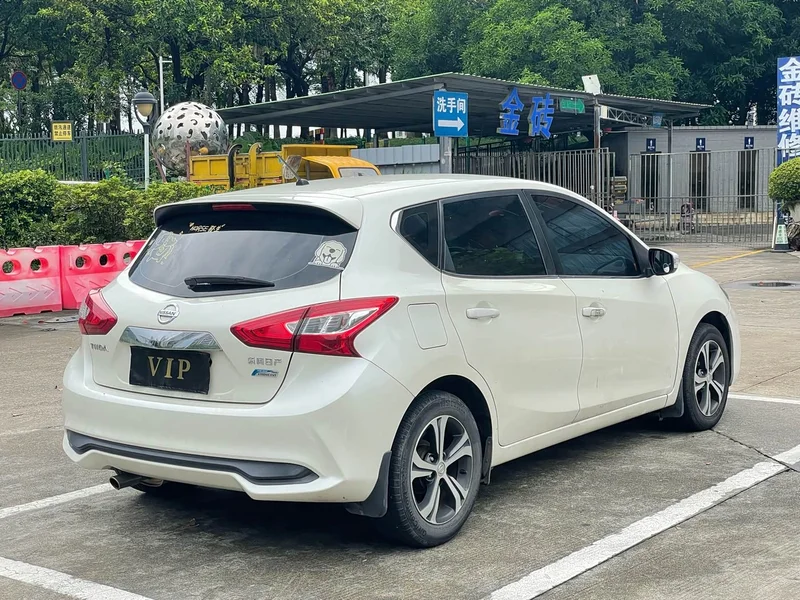 Nissan Tiida — фото 17