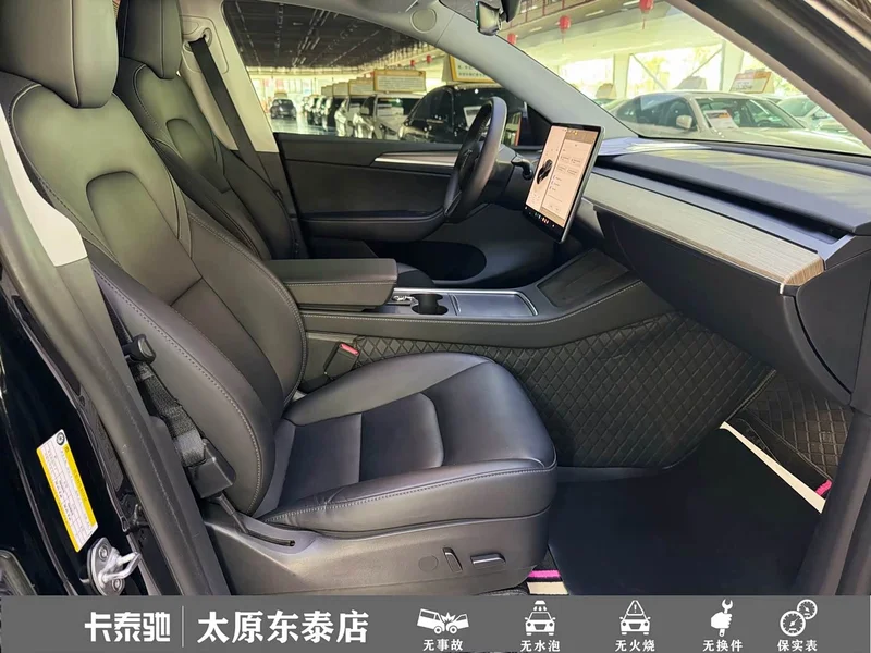 Tesla Model Y — фото 15